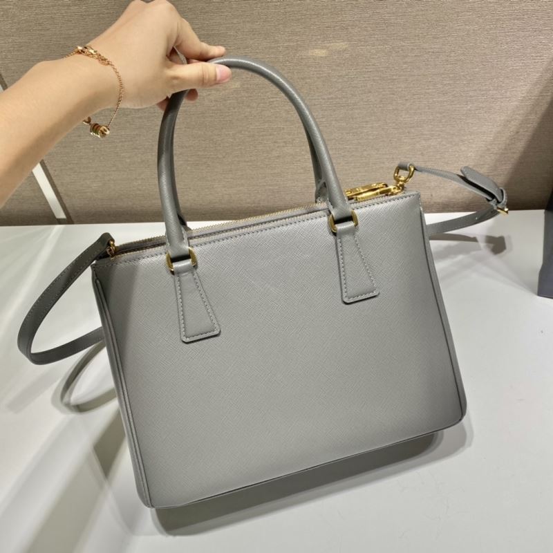 Pra*a top handle bags